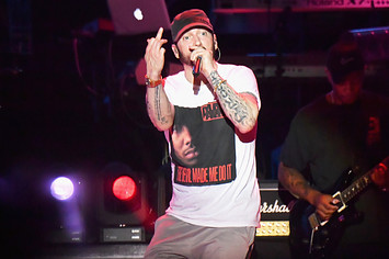 Eminem performing on stage in 2019