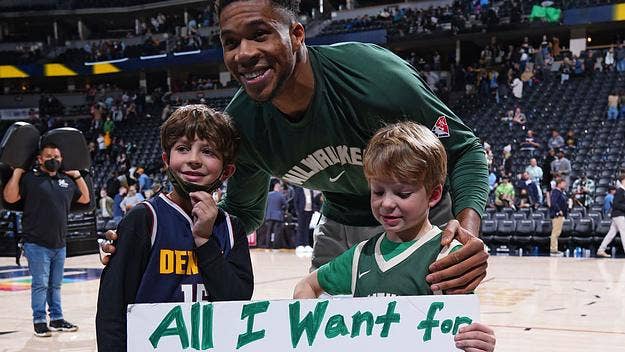 After the game, Giannis spotted a sign in the crowd that read “All I want for my birthday is to meet Giannis,” and decided to meet two young fans. 