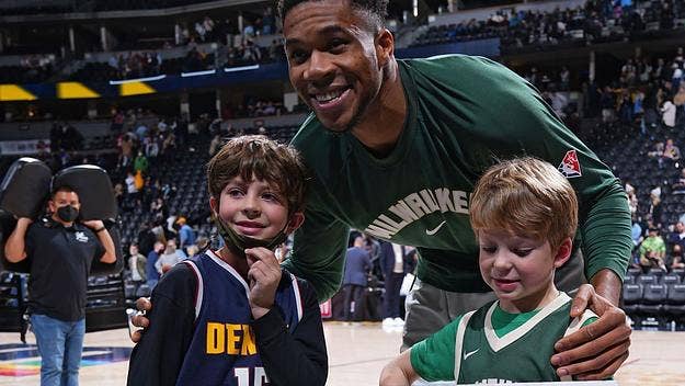 After the game, Giannis spotted a sign in the crowd that read “All I want for my birthday is to meet Giannis,” and decided to meet two young fans.