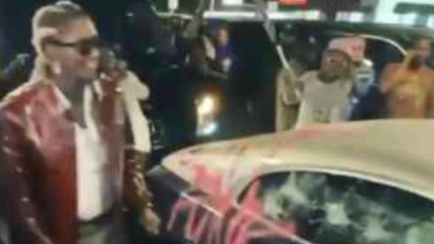 Ahead of the arrival of his new project 'Punk,' Young Thug and his crew were filmed destroying a Rolls-Royce at his album release party in Hollywood.