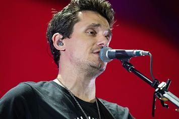 John Mayer performing on tour in 2019