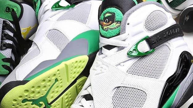 The Oregon Ducks Air Jordan 8 features suede, mesh, perforated leather, and a first-ever black 'Duck Head' logo as a symbol of unity. Click for a detailed look.