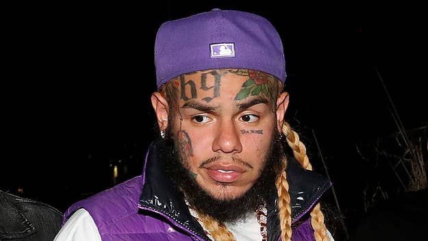6ix9ine's Spotify account was allegedly hacked and edited with some NSFW alterations made to its profile picture, biography, artist pick section, and more. 