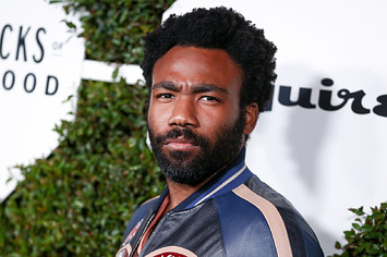 Donald Glover poses for photos at Esquire event.