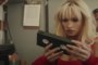 Lily James is seen as Pam Anderson in this still.