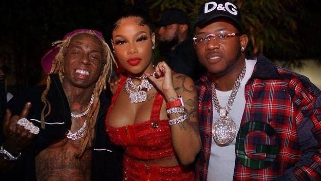 Lil Wayne welcomed his latest Young Money signee Mellow Rackz to the label by gifting her a YM chain, while Mack Maine gave her $100,000 in cash.