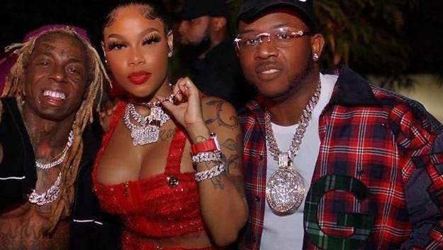 Lil Wayne welcomed his latest Young Money signee Mellow Rackz to the label by gifting her a YM chain, while Mack Maine gave her $100,000 in cash.