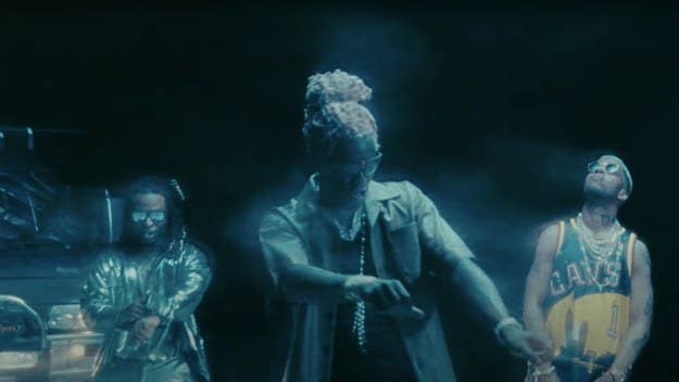 Strick, Young Thug, and Kid Cudi all take a trip in the new psychedelic video for their collaboration "Moon Man" off YSL's album 'Slime Language 2.'