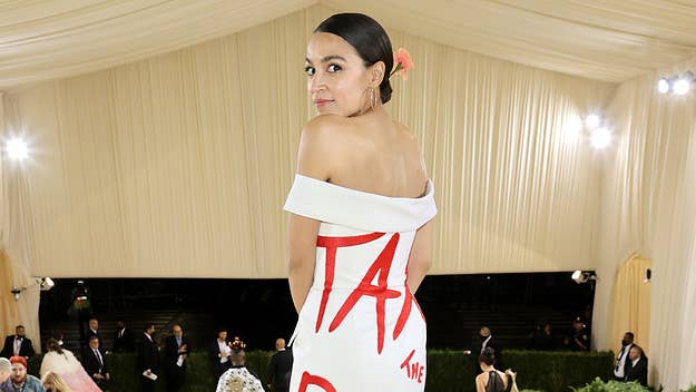The Brother Vellies gown was emblazoned with the slogan "tax the rich." Here, AOC and designer Aurora James give some insight on the process behind it.