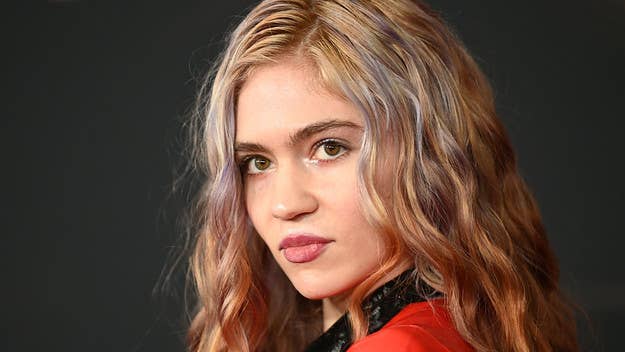 The track, which Grimes has previously teased, was played during her set at a virtual reality festival over the weekend and is titled "100% Tragedy."