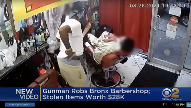 A suspect is by New York City police wanted after robbing a barber in the Bronx ​​​​​​​and making off with over $28,000 worth of jewelry and cash.