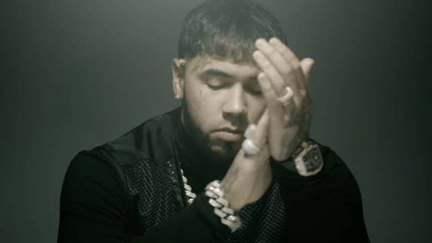 Anuel shares his latest single on what would've been his anniversary with Karol G, as he asks his ex questions in the track's emotional music video. 
