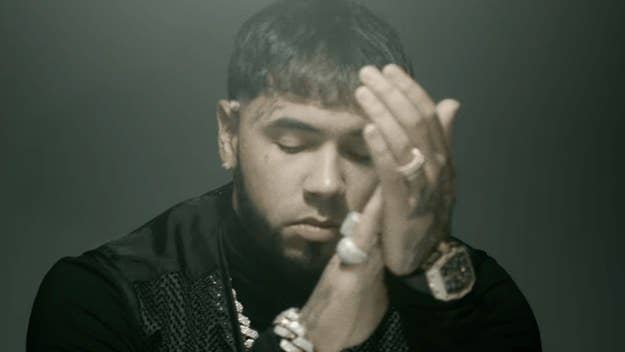 Anuel shares his latest single on what would've been his anniversary with Karol G, as he asks his ex questions in the track's emotional music video.