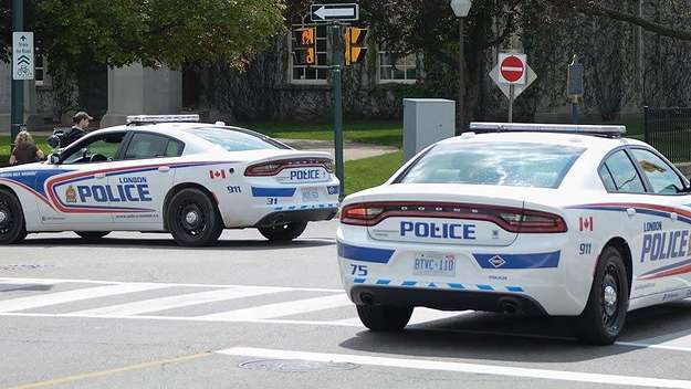 Police say a man was ‘purposely’ hit by a car following an argument after one neighbour urinated on another’s lawn on Friday in London, Ontario.