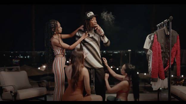 Wiz Khalifa and his Taylor Gang labelmates Young Deji and Feezy have delivered the new song and accompanying video for "Oh Wow." Wiz directed the visual.