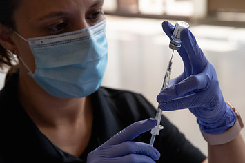 Health Department emergency preparedness specialist fills syringes