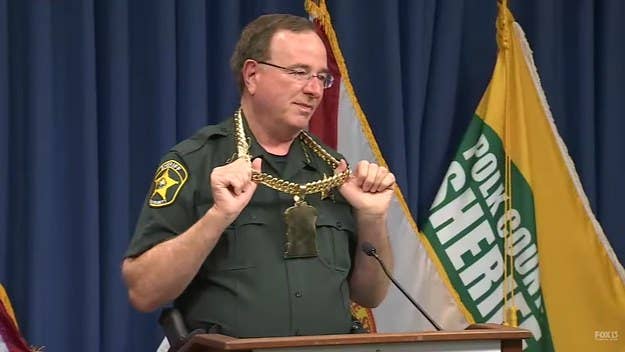 Sheriff Grady Judd tried on a large gold chain and rapped during a press conference this week, where he mentioned that some of those arrested were rappers.
