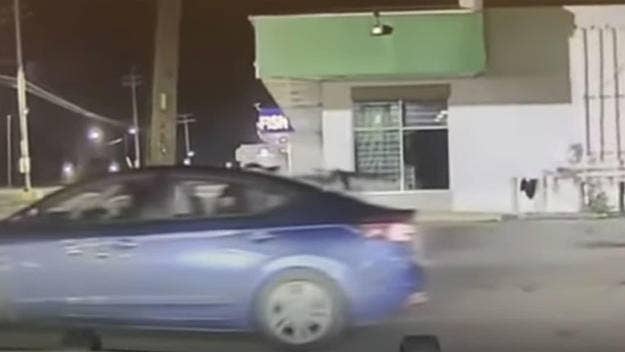 Two Detroit police officers are currently under investigation over dash-cam footage that appears to show them fleeing the scene of a drive-by shooting.
