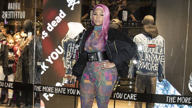 Nicki Minaj called out a reporter who criticized the rapper's recent comments about the COVID-19 vaccine, accusing the person of harassing her family.
