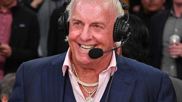 Ric Flair took to Twitter to say that he’s not the person in a viral photo that seemingly shows a man engaging in oral sex with a woman on a train.