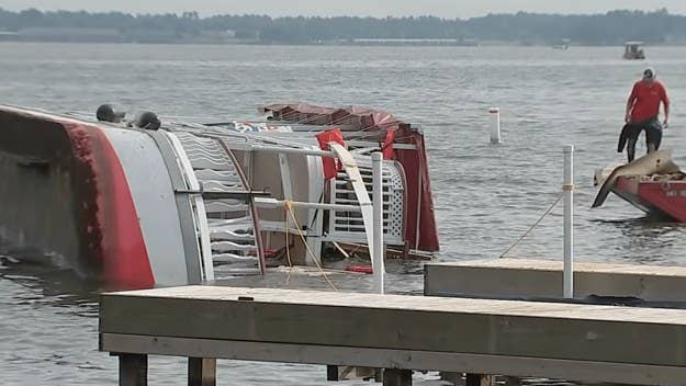 A double-decker party boat with 53 people on board capsized in Texas on Saturday night during a severe thunderstorm, leaving one person dead.