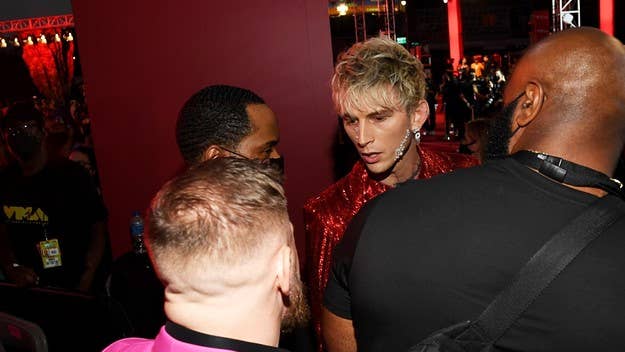 Machine Gun Kelly and Conor McGregor needed to be separated on the red carpet of the MTV Video Music Awards after the two got into a physical altercation.