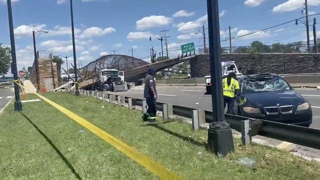 A pedestrian bridge collapsed onto a Washington D.C. highway, leaving at least five injured and trapping a truck that was carrying 500 gallons of diesel.