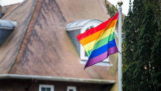A South Florida couple was forced to pay a $50 daily fine by a homeowner's association for displaying a small gay pride flag in the front yard of their home. 