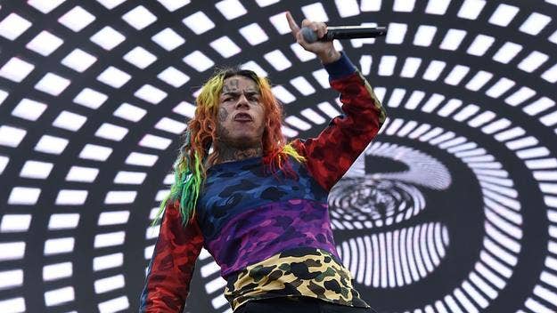 6ix9ine took to social media to troll Lil Reese after the rapper was shot in a parking garage. 6ix9ine went so far as to share a GoFundMe for the rapper.