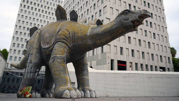 Police believe that a reported missing man died after trying to retrieve his phone inside the papier-mâché statue of a stegosaurus in Spain.
