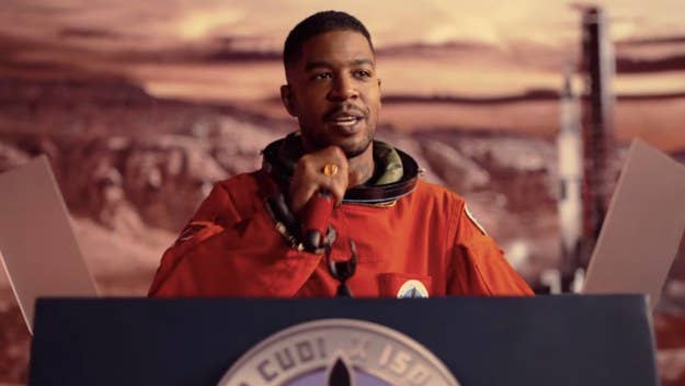 Kid Cudi is seen wearing a NASA-inspired orange spacesuit in the trailer for the special, which sees Cudi collaborating with the International Space Orchestra.