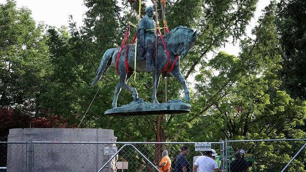 The removal of the statue took about a day, as a crew prepared its removal Friday and was successful in lifting it off its base on Saturday to audience cheers.