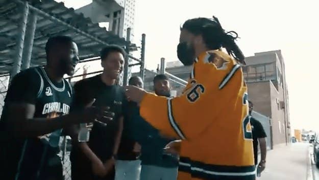 J. Cole and RDCWorld's Mark Phillips finally met, and even recreated the viral meme Mark and company made years ago when Cole was dropping an album.