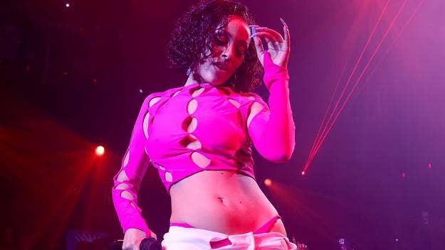 The 'Planet Her' rapper took over E11EVEN in Miami over the weekend and took a tumble during a performance of “Tia Tamera," which fans went on to joke about.