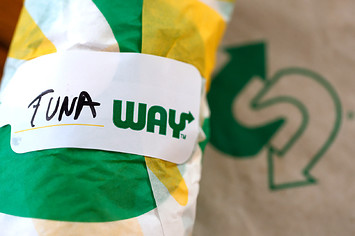 A label is displayed on a tuna sandwich from Subway.