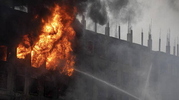 A fire engulfed a food and beverage factory outside Bangladesh’s capital, killing at least 52 people, many of whom were trapped inside behind a locked door.