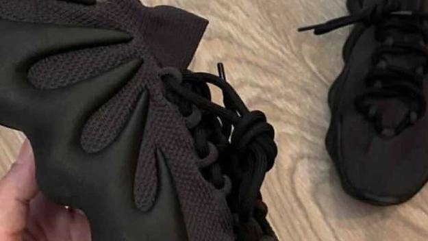 Kanye West's Adidas Yeezy 450 is set to release in a black-based 'Dark Slate' colorway during Spring 2021. Click for a first look and release information.
