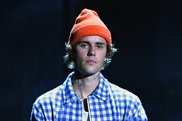 Justin Bieber performs onstage for the 2020 American Music Awards