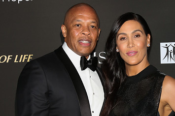 Dr. Dre (L) and his Wife Nicole Young (R) attend the City Of Hope Gala.