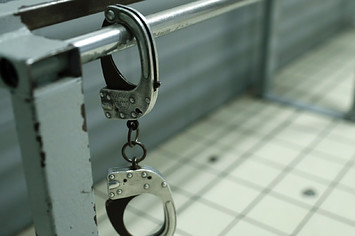 A photo taken shows handcuffs at the Commissariat de Police Nationale.