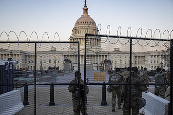 The US Capital is seen as National Guard secure the the grounds