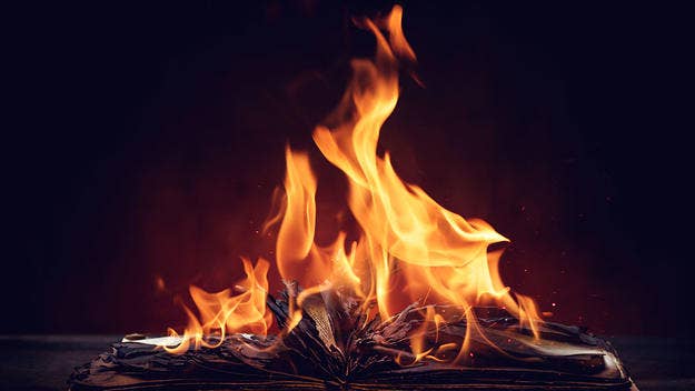 A Texas woman was arrested Sunday morning after the bible she set on fire in her backyard spread, and ignited her and her neighbor's duplex.