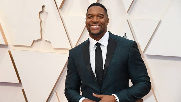 Television personality and former NFL player Michael Strahan shared a curiously timed video showing himself getting the iconic gap in his front teeth closed.