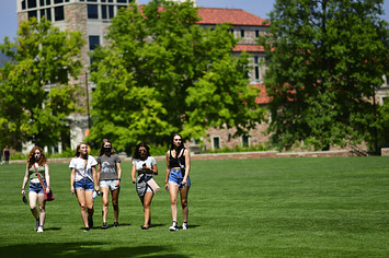 Freshmen walk through campus after moving into dormitories at University of Colorado Boulder