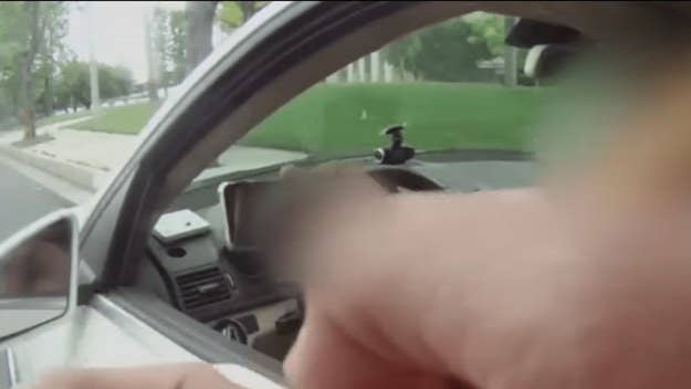 A deputy pulled over a woman for allegedly driving while on her phone, prompting her to call him a "murderer" multiple times and adding he'll "never be white."