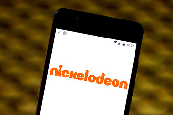 In this photo illustration the Nickelodeon logo is seen displayed on a smartphone.