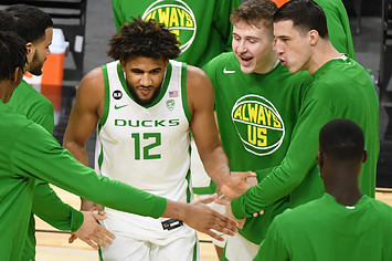 LJ Figueroa #12 of the Oregon Ducks is introduced before a game
