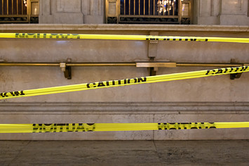 A caution tape placed inside Grand Central during the coronavirus pandemic.