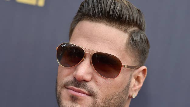 'Jersey Shore' cast member Ronnie Ortiz-Magro was taken into police custody in Los Angeles on Thursday and charged with felony domestic violence.