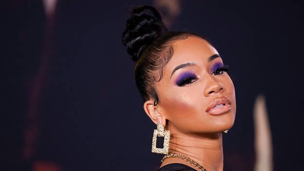 When asked if Saweetie would have a threesome with her partner, the Bay Area rapper said she would give him the "honor" of choosing a man to join them.